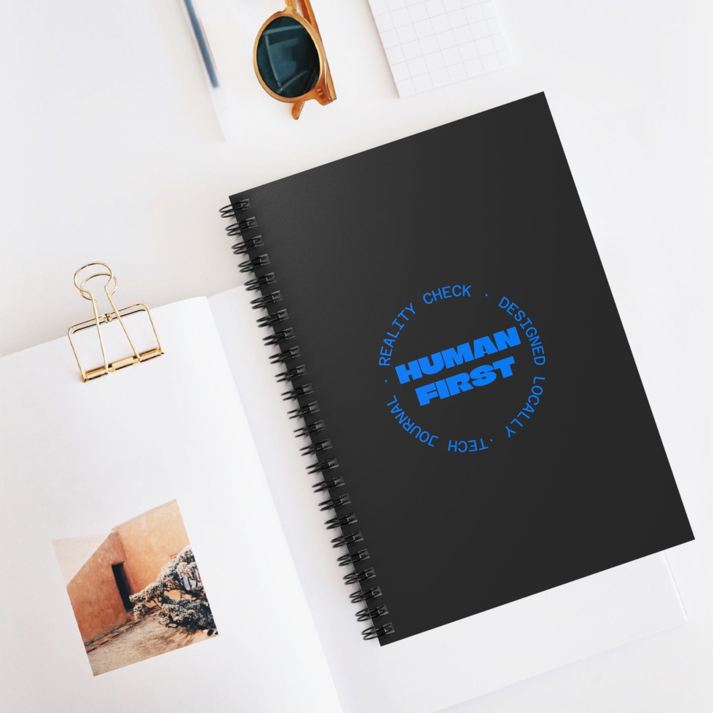 Human First Spiral Notebook